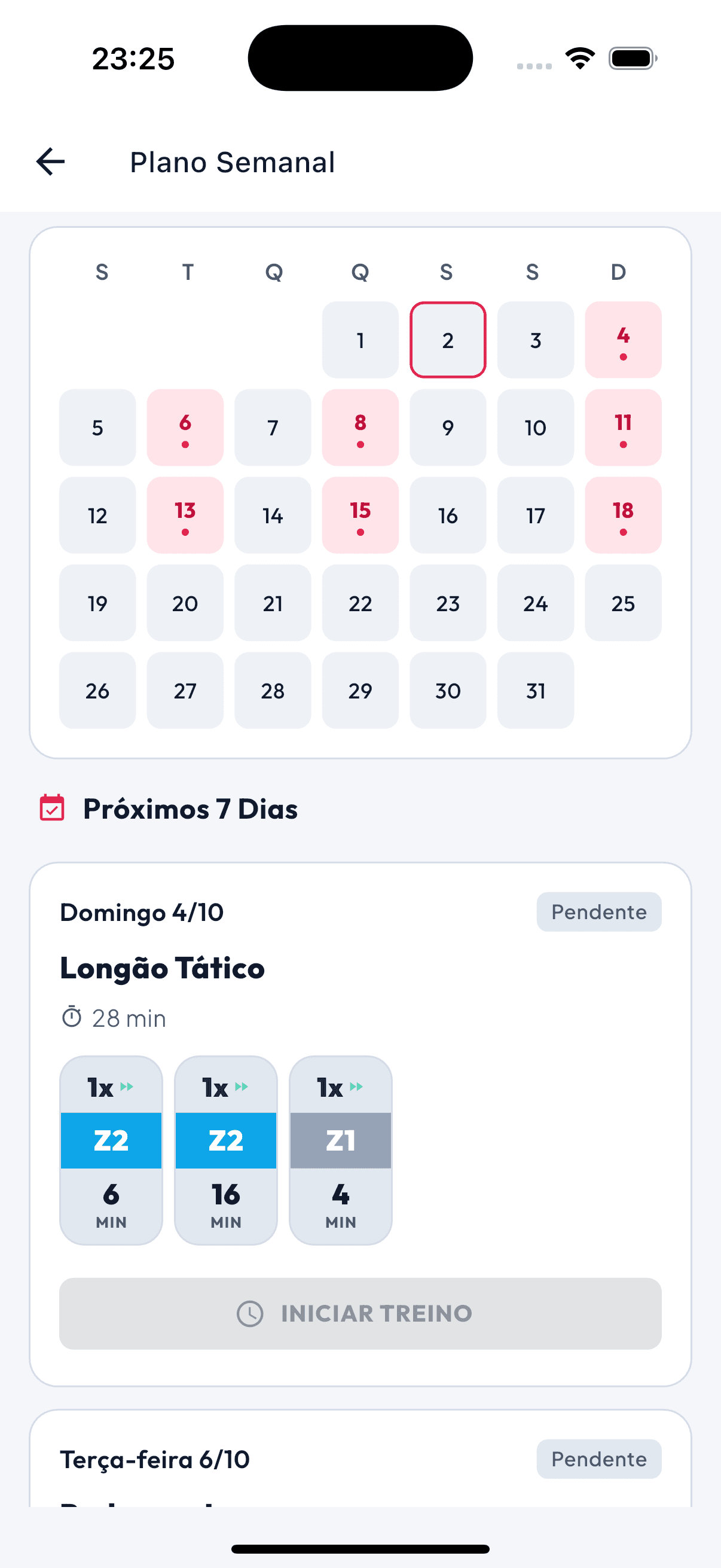 Tela do Plano Semanal do Horda Run: calendário do mês com os dias de treino destacados e o card do Longão Tático com blocos Z2, Z2 e Z1.